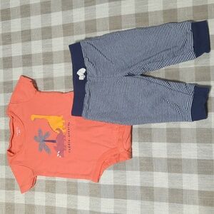 3/$12 9M Carter's dinosaur orange onesie with navy blue striped pants